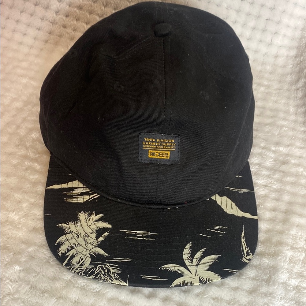 10. Deep Black Hat with Tropical Print Brim